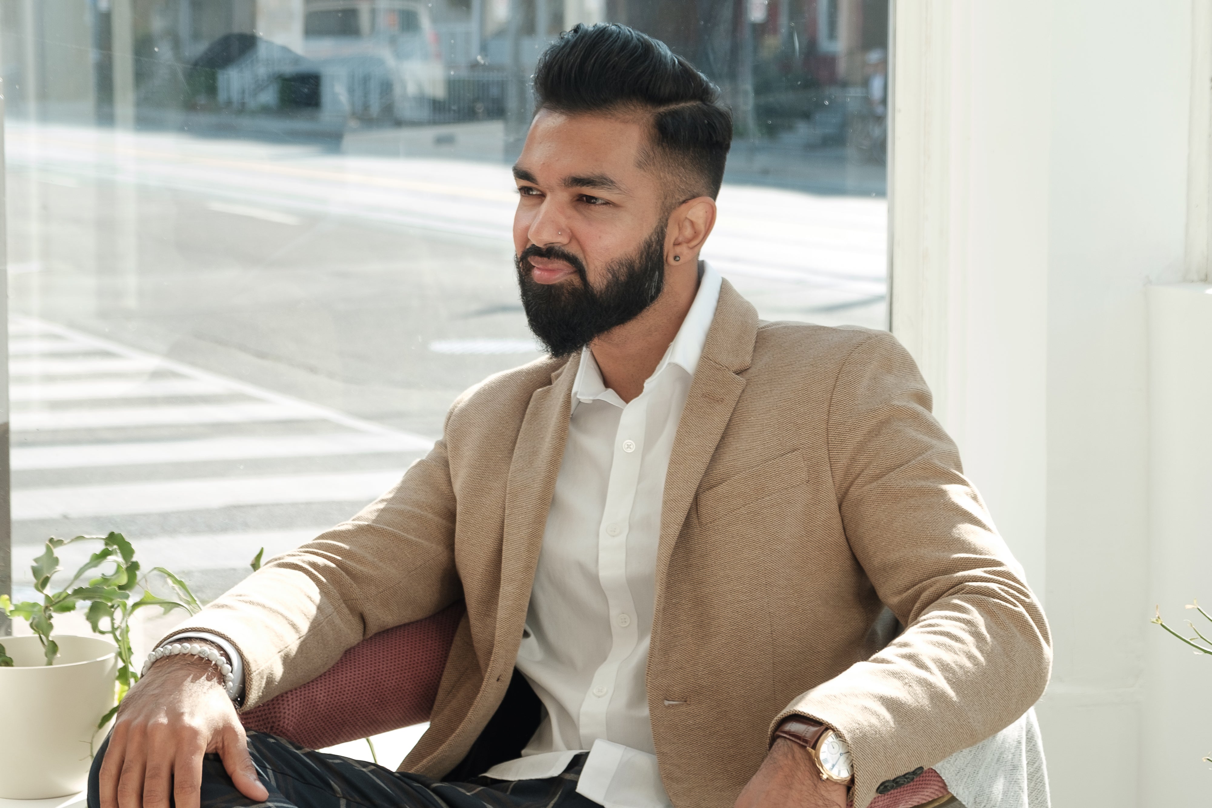 files/dapper-young-man-sits-in-store-window.jpg